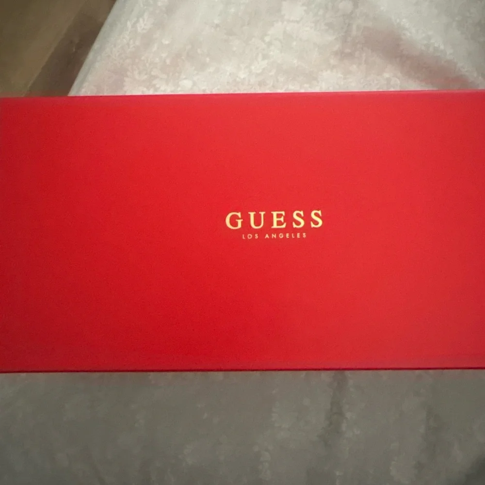 GUESS Beige Monogram Crossbody Bag - Picture 2 of 4